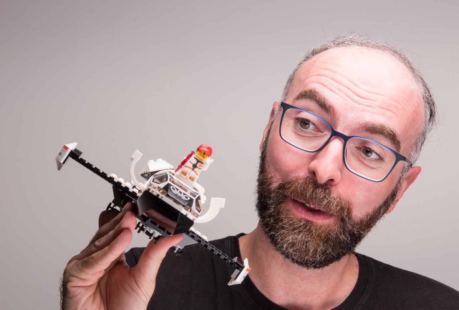 Dr. Barhan Pekel with a toy spacecraft